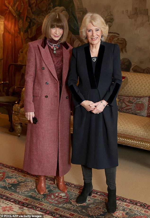 Queen Camilla poses alongside Anna Wintour at start of London Fashion Week just hours after Andrew's arrest